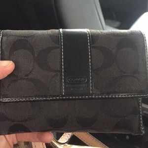 Coach tri-fold wallet.